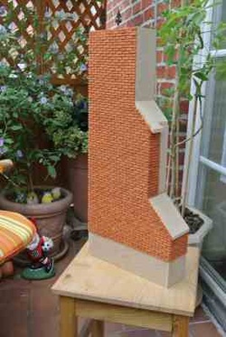 small tudor brickslips added to the large chimney